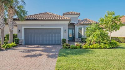 4057 Cascina Way, House other with 3 bedrooms, 3 bathrooms and null parking in Sarasota FL | Image 1