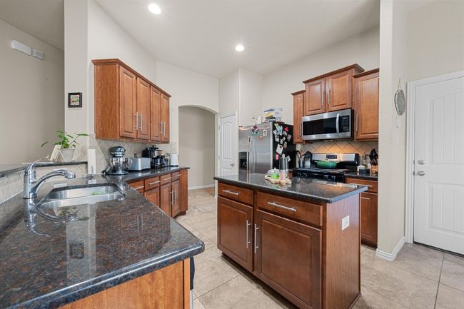 327 Saffron Spgs, House other with 3 bedrooms, 2 bathrooms and 4 parking in Buda TX | Image 16