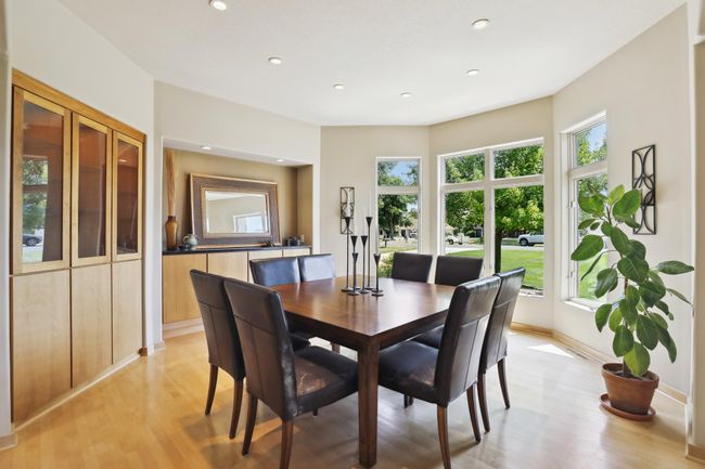 Separate formal dining is perfect for entertaining guests! Gorgeous maple, hardwood floors!!! | Image 47