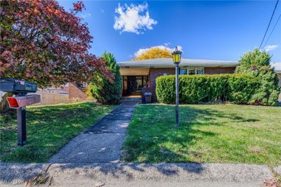 View of front of house featuring a front lawn | Image 1