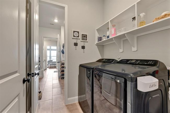 Laundry room connets to primay closet | Image 18
