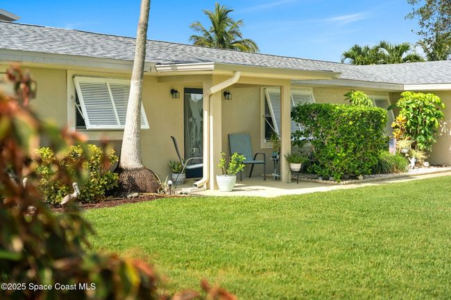 Front entrance, lush landscaping | Image 6