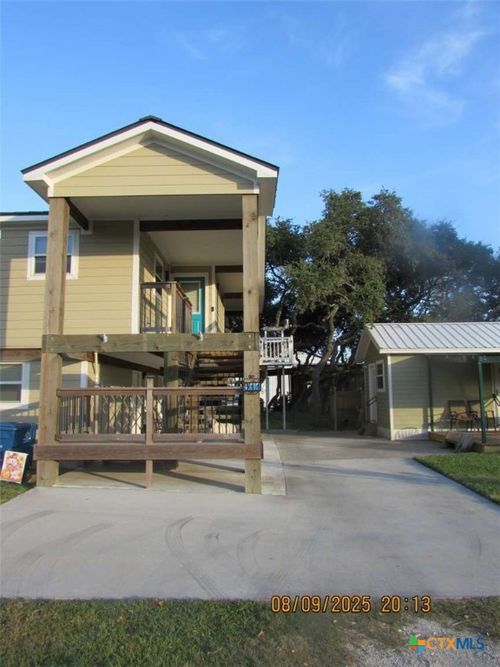 911 W Madison Ave, Port O Connor, TX, 77982-2187 | Card Image