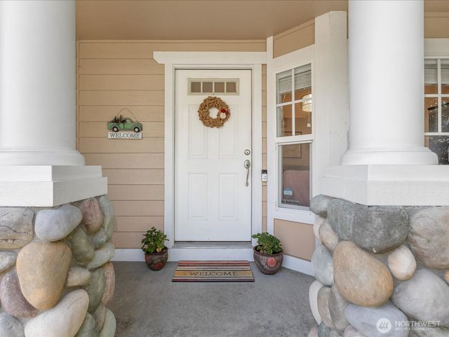 Welcoming front entry covered porch | Image 5