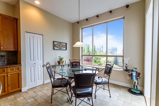 Dining space with baseboards and recessed lighting | Image 11