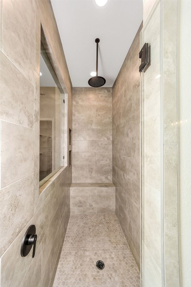Bathroom featuring tiled shower | Image 23