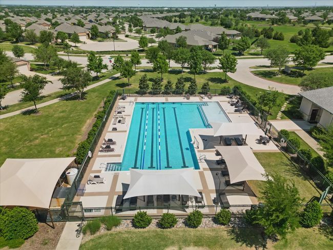 View of swimming pool featuring fence | Image 29