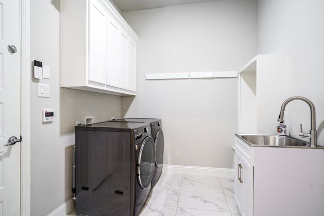 Laundry with mud bench and sink | Image 19