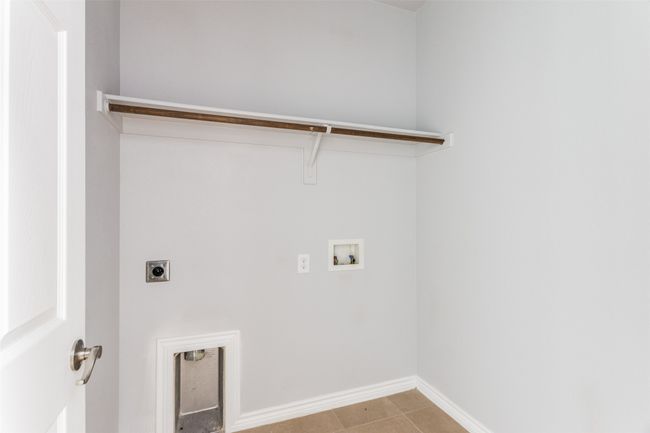 Laundry room featuring washer hookup and electric dryer hookup | Image 22