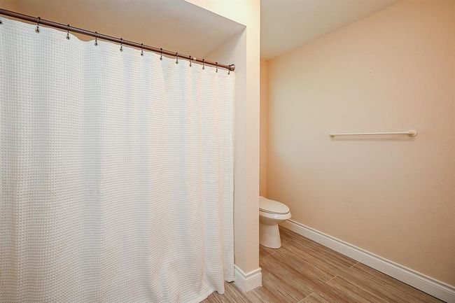 A bathtub in the secondary bathroom makes for easier clean-up time for the kids or...for the adults, a great place to sneak away to simply relax the muscles. | Image 26