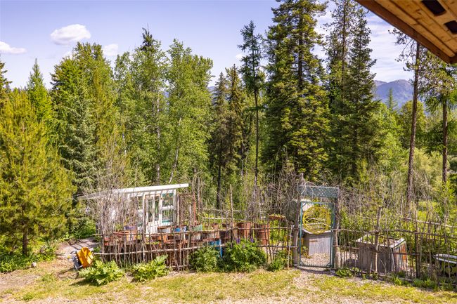 View of yard with a view of trees and a mountain view | Image 103
