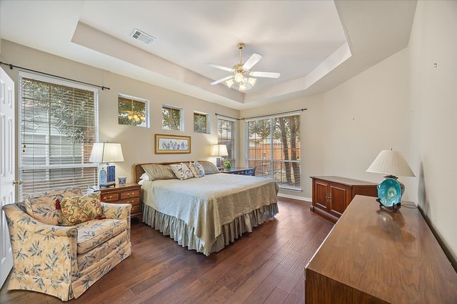 Beautifully detailed master bedroom opens onto master bath | Image 14
