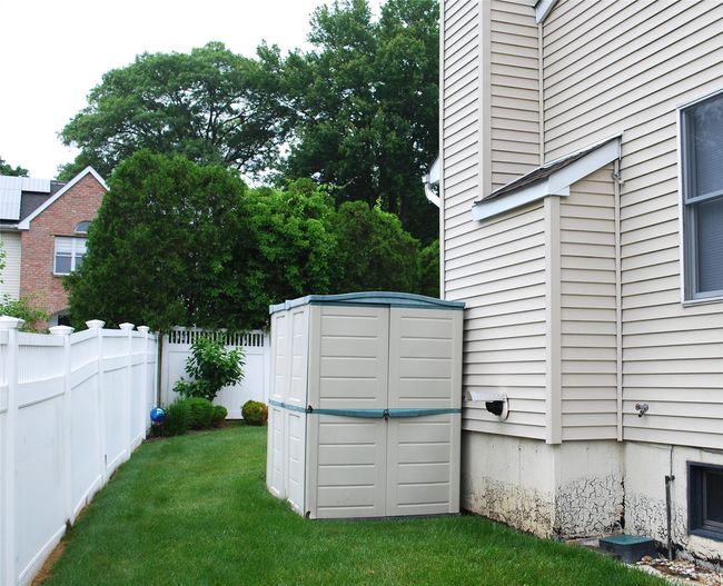 View of yard with a shed | Image 44