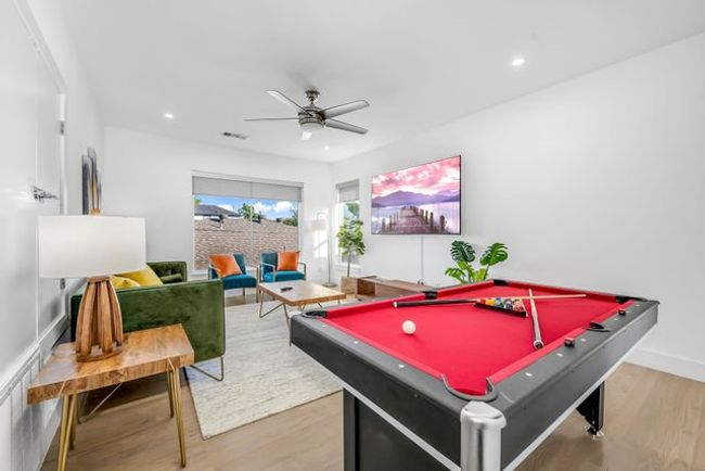 Rec room with ceiling fan, light hardwood / wood-style flooring, and billiards | Image 27