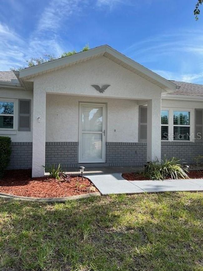 9711 Sw 97 Th Pl, House other with 2 bedrooms, 2 bathrooms and null parking in Ocala FL | Image 4