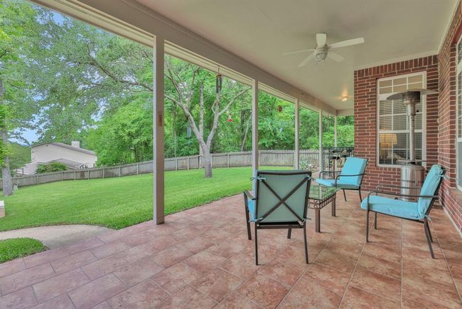Deep porch extends the width of the home. | Image 6