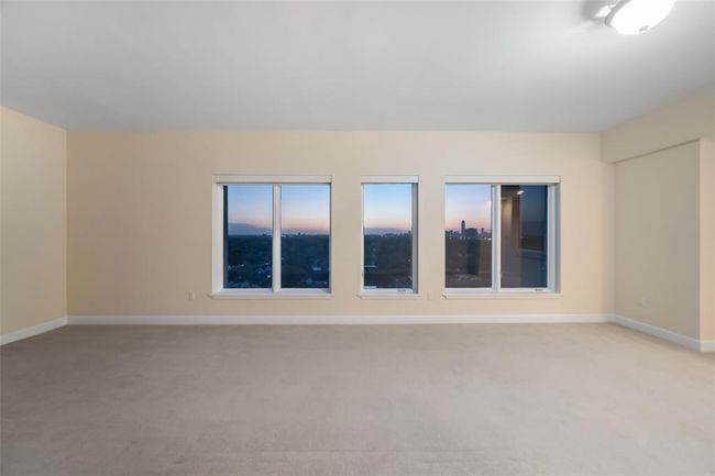 Another angle of this primary room at sunset. | Image 23