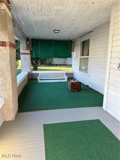 View of front patio with a porch | Image 3