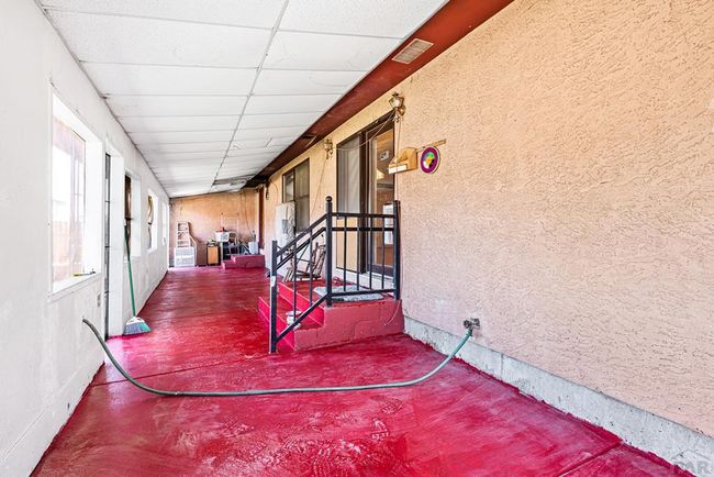 enclosed sun room, main level to back yard and one | Image 26