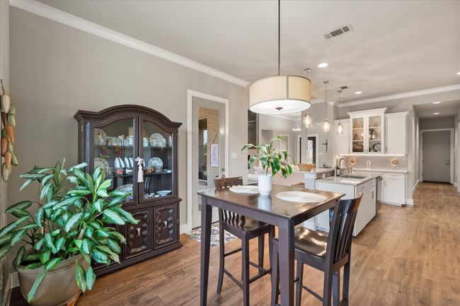 Breakfast area looking back to kitchen | Image 12