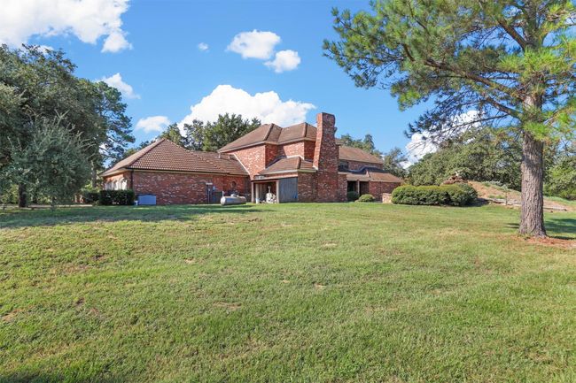 Back of property featuring a lawn | Image 31
