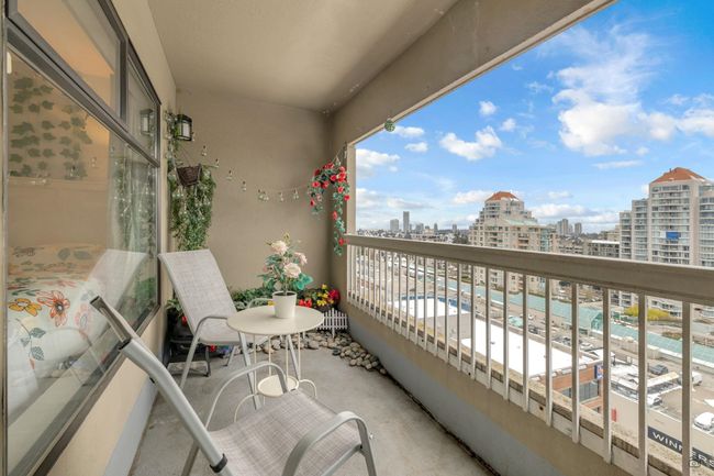 Balcony with a view of city | Image 23