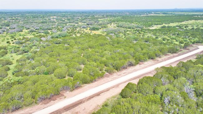 View of property location with a heavily wooded area | Image 5