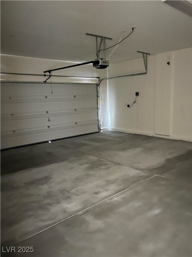 Garage featuring a garage door opener | Image 26