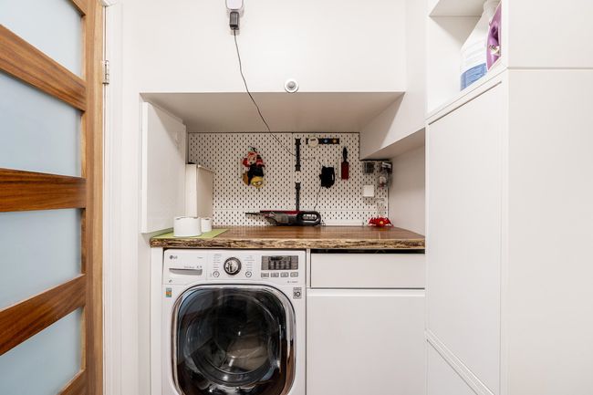 Laundry area with washer / clothes dryer | Image 13