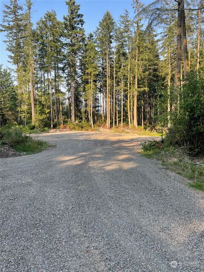 Cleared driveway and entrance to the property | Image 1