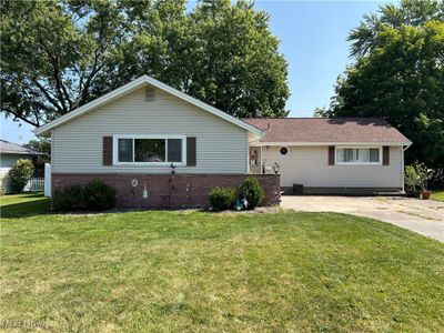 Single story home with a front yard | Image 2