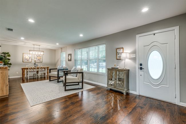 Entrance foyer with recessed lighting, dark wood-style flooring, and a chandelier | Image 6