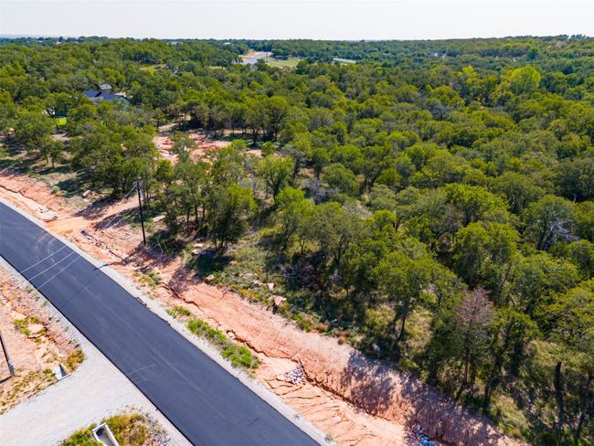 Aerial view of a heavily wooded area | Image 24
