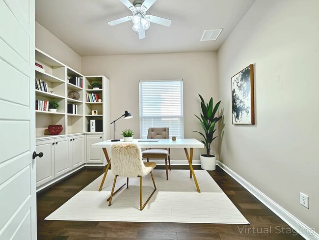 Office space featuring dark wood-style floors and a ceiling fan | Image 23
