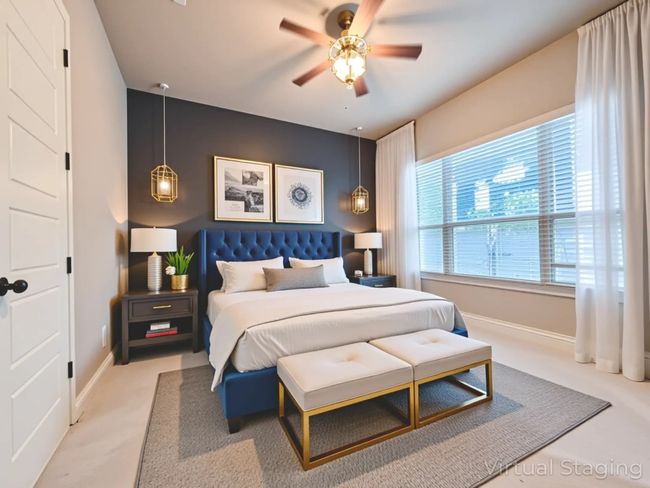 Bedroom with light carpet and a ceiling fan | Image 27