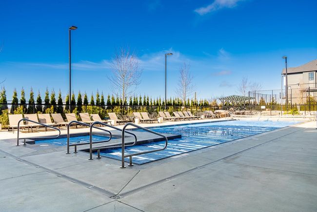 Community pool featuring a patio and fence | Image 35