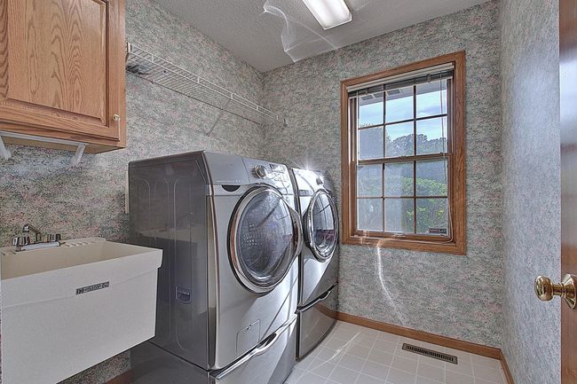 Main-floor Laundry - Next to the mudroom. | Image 11