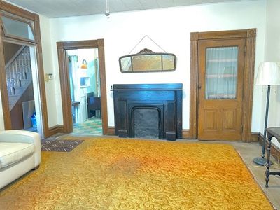 A different view of living room with fireplace (decorative) | Image 3