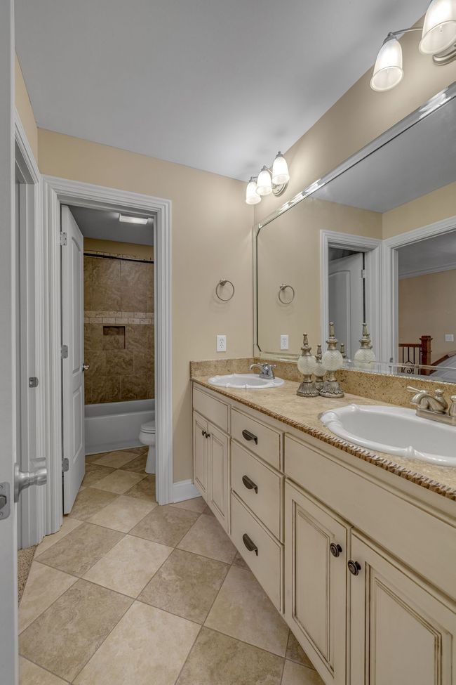 One of the two second-floor baths | Image 35