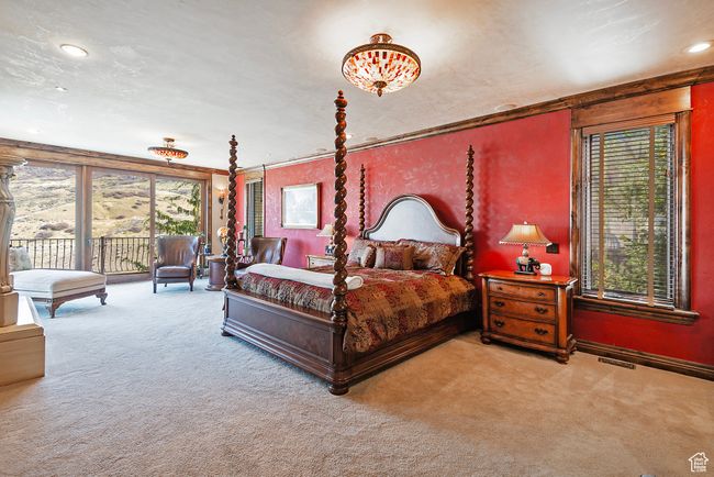Bedroom with multiple windows, access to outside, carpet flooring, and visible vents | Image 29