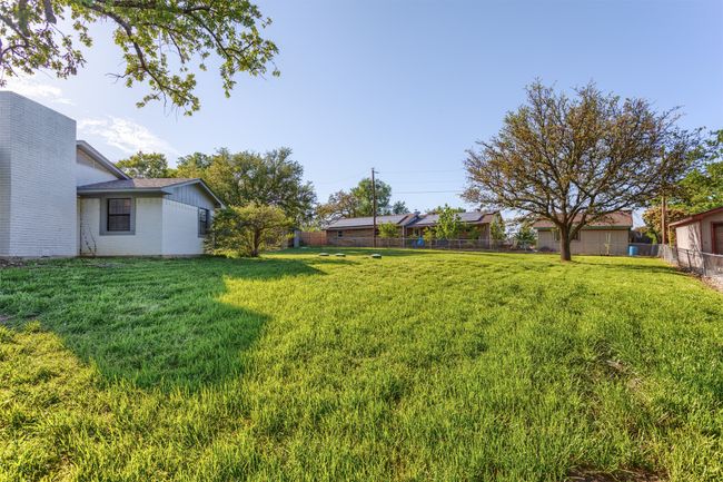 View of yard featuring fence | Image 28
