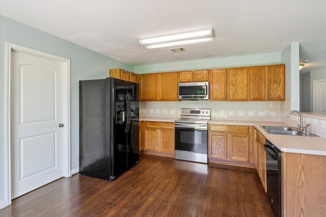 Laundry room/pantry off the kitchen | Image 13