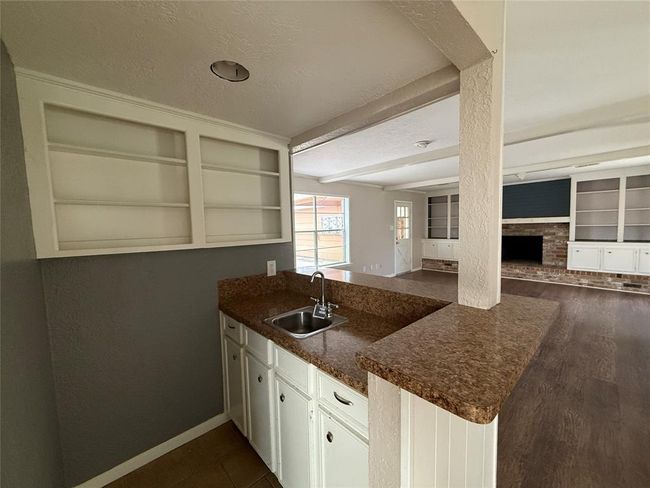 Wet Bar conveniently located between den and breakfast ares | Image 9