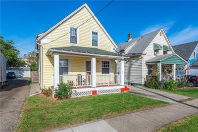 View of front of home featuring a front lawn and a porch | Image 2