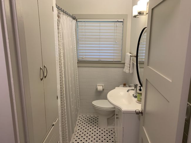 Bathroom featuring tile flooring. | Image 13