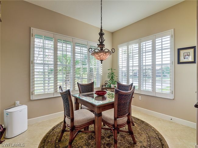 View of tiled dining area | Image 10