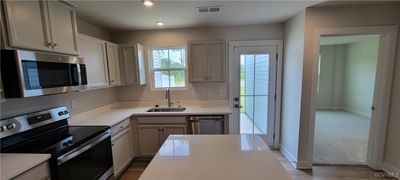 7245 Peyton Randolph Lane, Townhouse with 3 bedrooms, 2 bathrooms and null parking in New Kent VA | Image 2