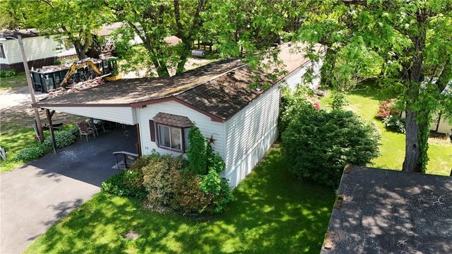 View of front of house with a front lawn and a carport | Image 7