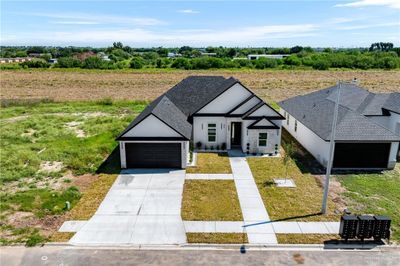 1016 Broken Arrow Drive, House other with 4 bedrooms, 3 bathrooms and 2 parking in Alamo TX | Image 3