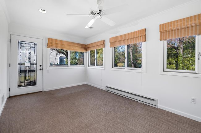 Bright sunroom/den with direct access to outdoor deck/patio | Image 14